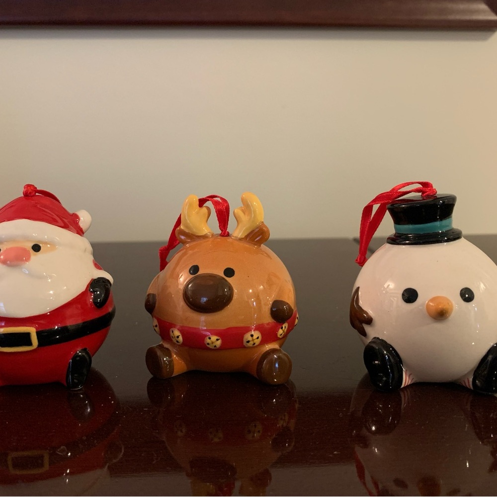 Adorable Santa, rain deer and snowman ornament set. Ceramic, 2 1/4” tall.